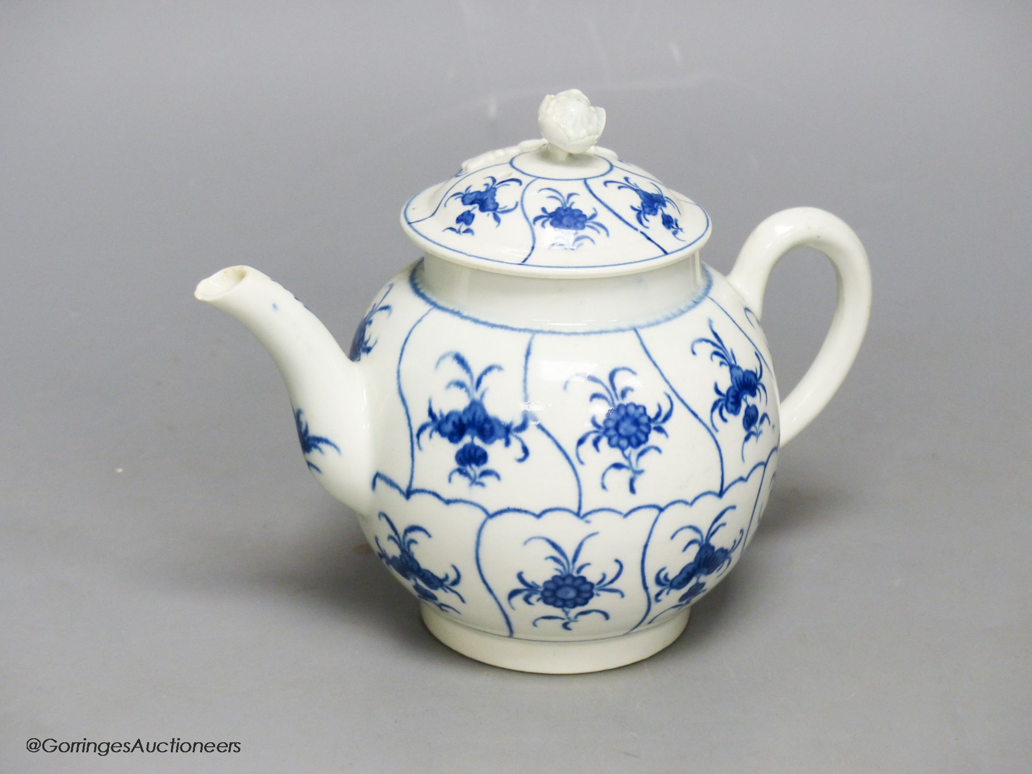 An 18th century Worcester blue and white teapot, height 14cm